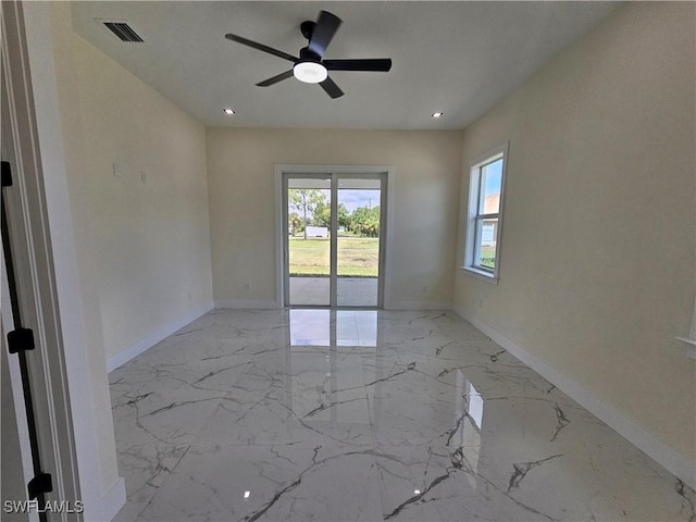 empty room featuring ceiling fan