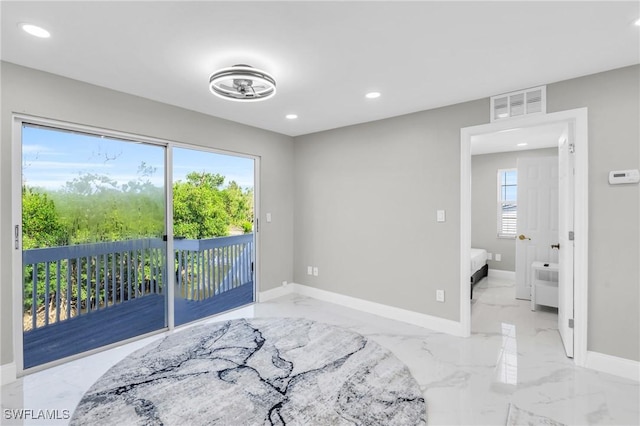 bedroom featuring access to outside and multiple windows