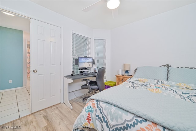 bedroom featuring ceiling fan and light wood-type flooring