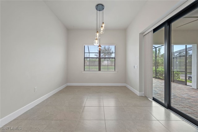 unfurnished dining area featuring light tile patterned floors