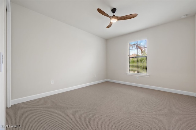 carpeted empty room with ceiling fan