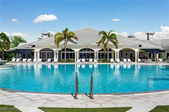 view of swimming pool with a patio area