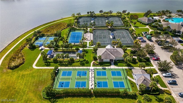 bird's eye view with a water view