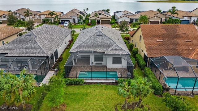 aerial view featuring a water view