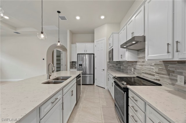 kitchen with white cabinetry, light stone countertops, sink, decorative light fixtures, and stainless steel appliances