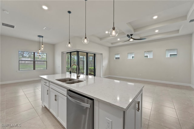 kitchen featuring a center island with sink, sink, dishwasher, and white cabinetry