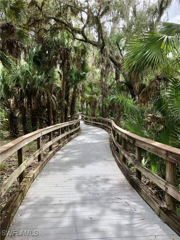 3020 Meandering Way Unit 201, Fort Myers, FL 33905 - view of community with a deck