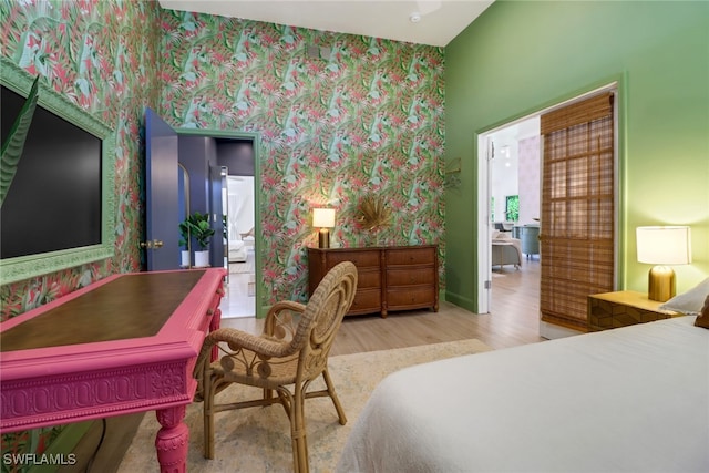 bedroom with light wood-type flooring