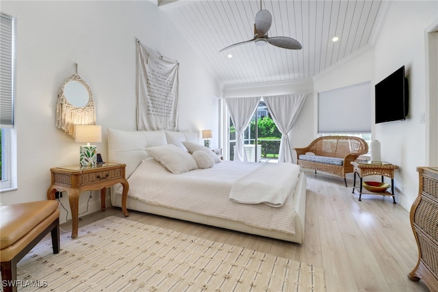 bedroom with ceiling fan, high vaulted ceiling, light hardwood / wood-style floors, and wooden ceiling