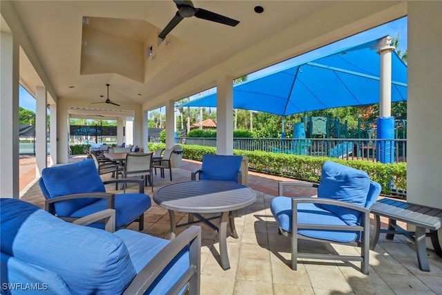 view of patio featuring ceiling fan and outdoor lounge area