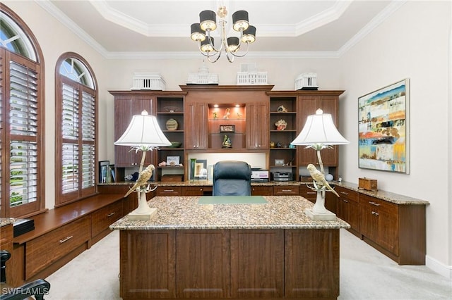 office area featuring a raised ceiling, a chandelier, light colored carpet, and a healthy amount of sunlight