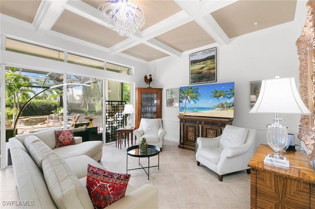 living room featuring a chandelier, light tile patterned flooring, beam ceiling, and coffered ceiling