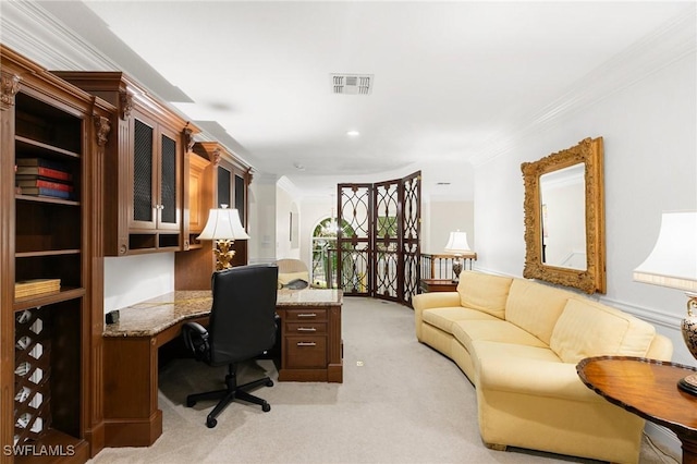 office space featuring crown molding and light carpet