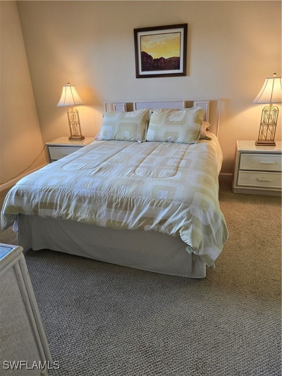 bedroom with light colored carpet