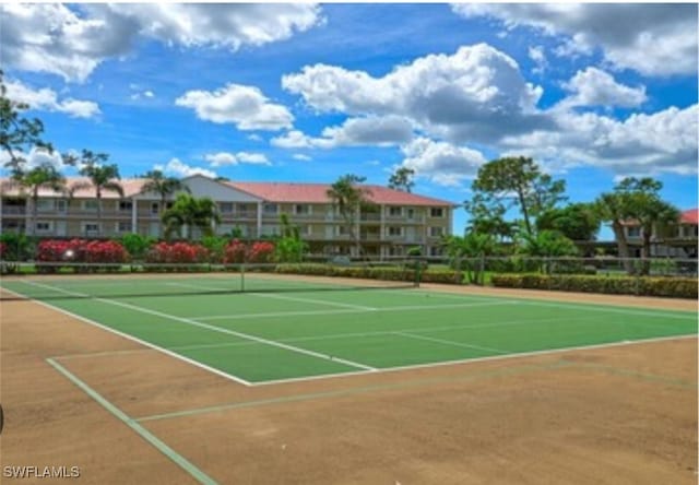 5975 Bloomfield Cir Unit C102, Naples, FL 34112 - view of tennis court featuring fence and community basketball court
