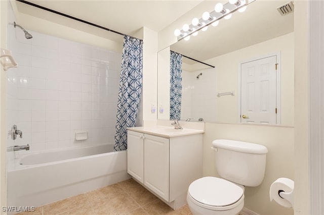 full bathroom featuring tile patterned flooring, vanity, shower / bath combo, and toilet