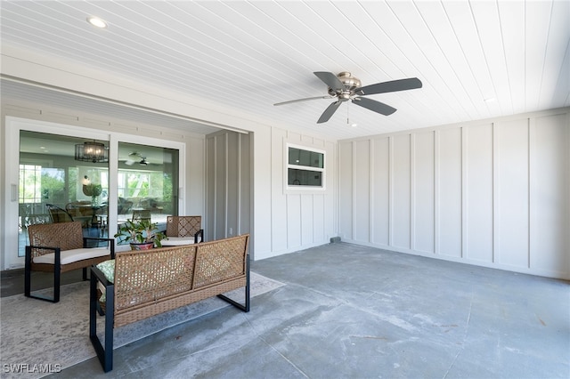 exterior space featuring ceiling fan