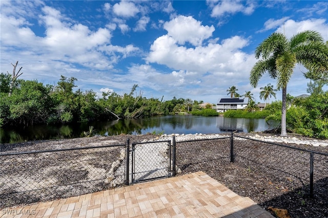 view of patio / terrace featuring a water view