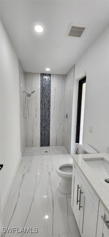 bathroom with walk in shower, toilet, and vanity