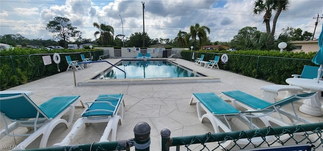 view of pool with a patio