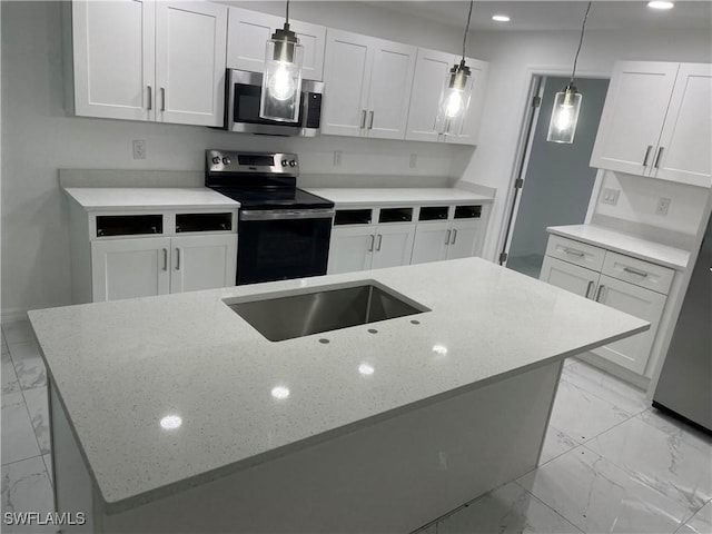 kitchen with light stone counters, white cabinets, decorative light fixtures, and electric range