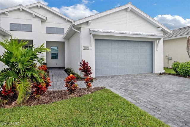 view of front of property with a garage