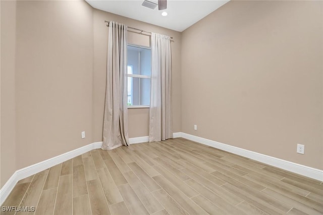 unfurnished room featuring light hardwood / wood-style flooring