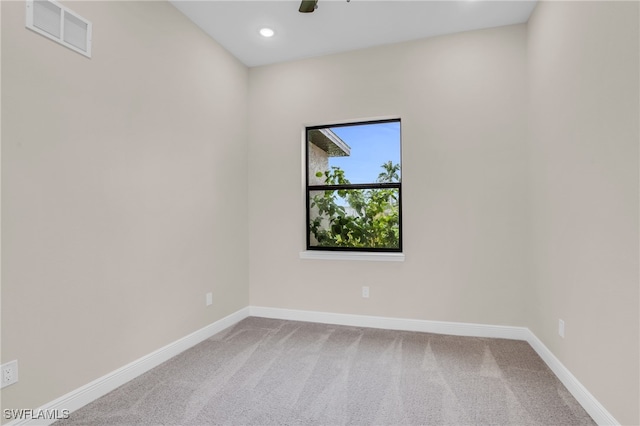 view of carpeted spare room