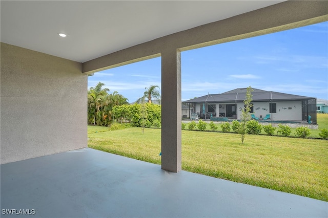 view of patio / terrace with a lanai