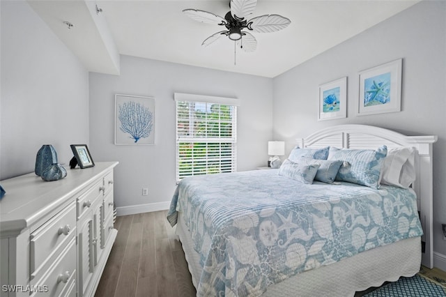 bedroom with ceiling fan and light wood-type flooring