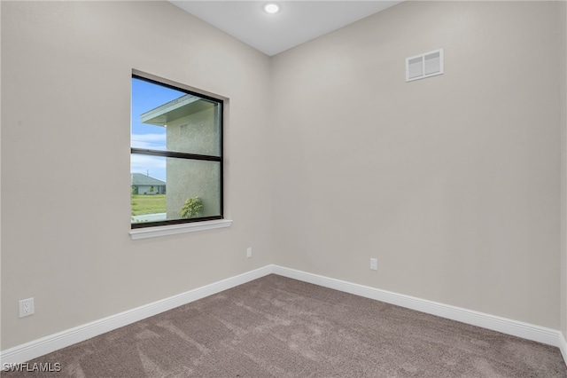 empty room with carpet floors