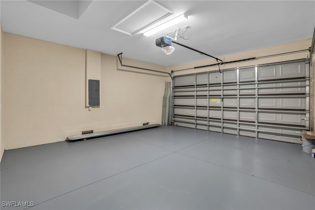 garage featuring a garage door opener and electric panel