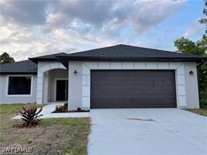 view of front of property featuring a garage