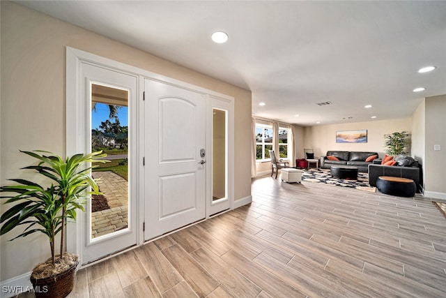 foyer with light hardwood / wood-style flooring