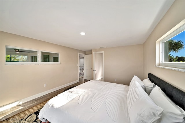 bedroom with hardwood / wood-style floors