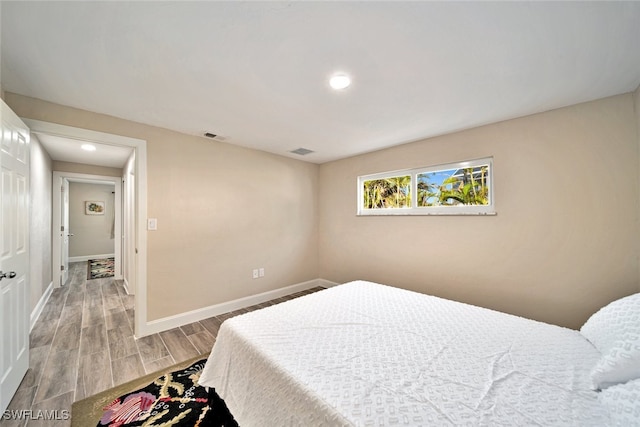 bedroom featuring light hardwood / wood-style floors