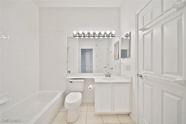 full bathroom with vanity, tile patterned floors, toilet, and tub / shower combination