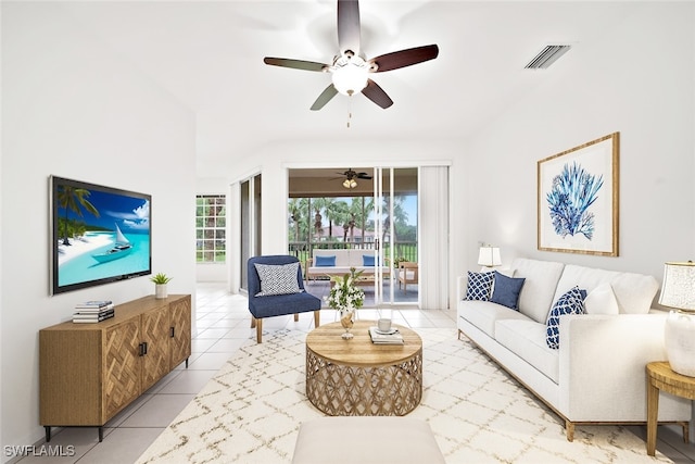 living room with ceiling fan and light tile patterned floors