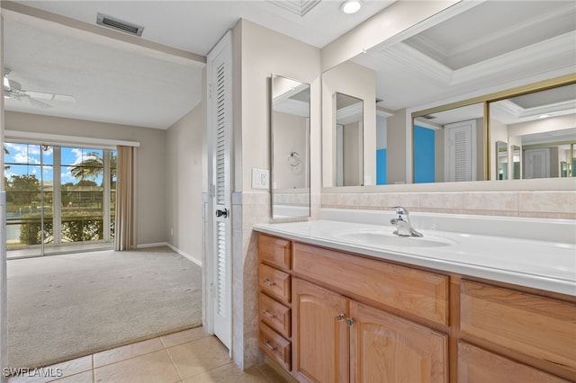 bathroom featuring vanity, visible vents, a ceiling fan, and tile patterned floors