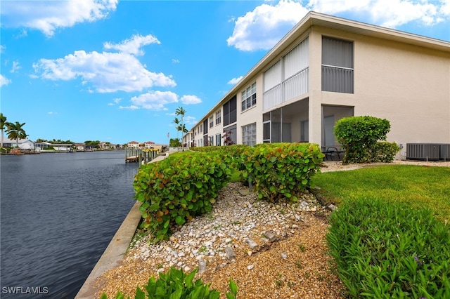 view of building exterior featuring a water view