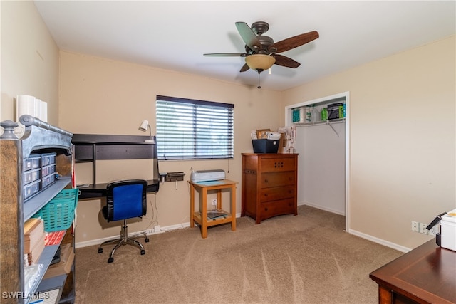 carpeted office with ceiling fan