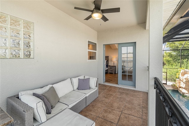 exterior space with ceiling fan, outdoor lounge area, and a lanai