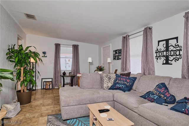 living room featuring tile patterned flooring