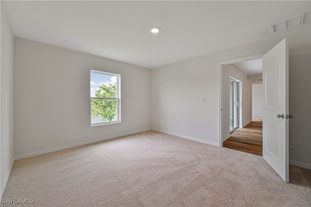 empty room featuring carpet flooring