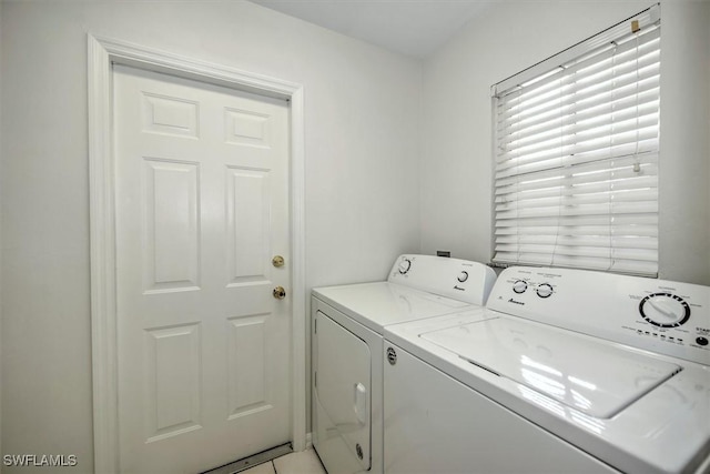 laundry area featuring laundry area and separate washer and dryer