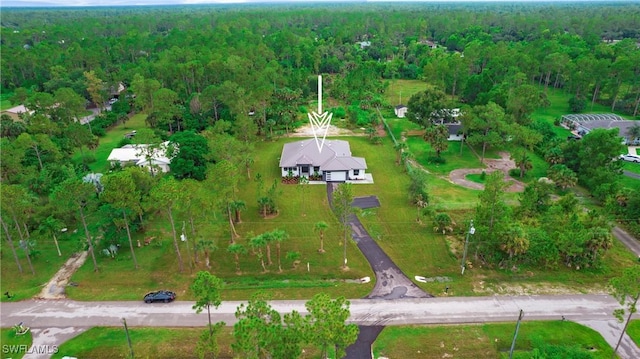 3660 4th Ave NE, Naples, FL 34120 - birds eye view of property featuring a view of trees
