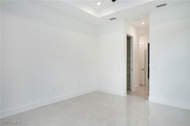 3660 4th Ave NE, Naples, FL 34120 - spare room with baseboards, visible vents, and recessed lighting