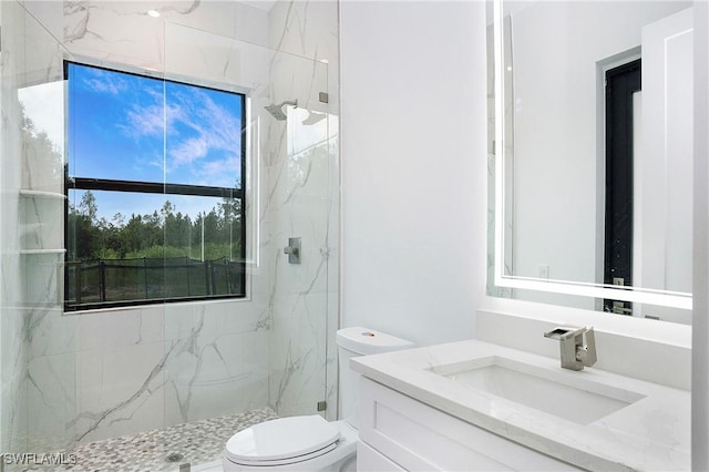 3660 4th Ave NE, Naples, FL 34120 - full bath with a marble finish shower, toilet, and vanity