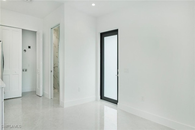 3660 4th Ave NE, Naples, FL 34120 - spare room with baseboards and recessed lighting