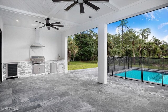 view of pool with ceiling fan, sink, a patio area, and area for grilling